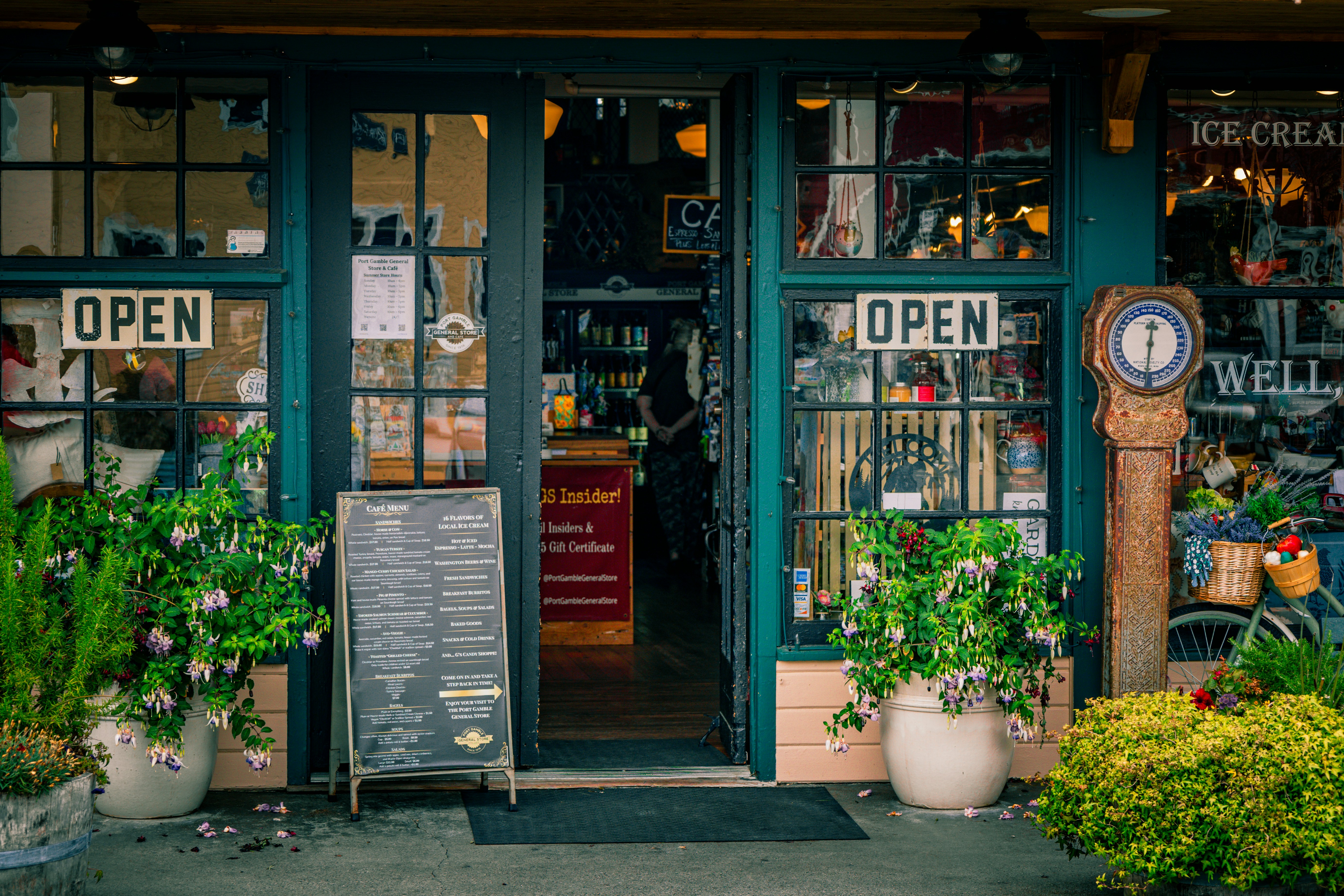 Small business storefront with an open sign